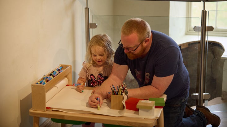 A family in the activity room at Charterhouse